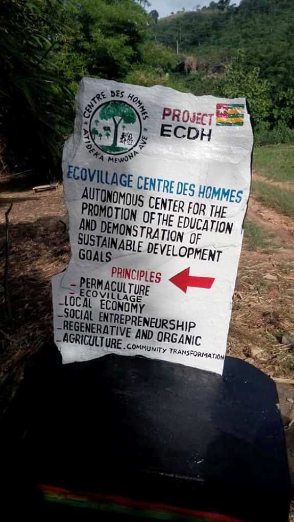 Projet Ecovillage Centre des Hommes panneau version Anglaise