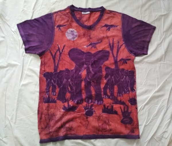 T-shirt batik for men. In front a herd of elephants, the sun is above and in the back the dense forest; Red. 74 x 40 cm