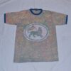 T-shirt batik unisex. In front lion of Juda and on the back dotted line, red-yellow-green, blue collar. 73,5 x 45,5 cm.