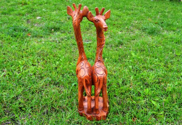 Giraffes carved, wood teak. 47,5 x 15 cm.